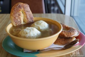 Warm matzo ball soup with bagel chips at Bagelmania deli in Las Vegas.